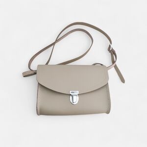 The Cambridge Satchel Company Pushlock Crossbody Bag in a neutral Tan